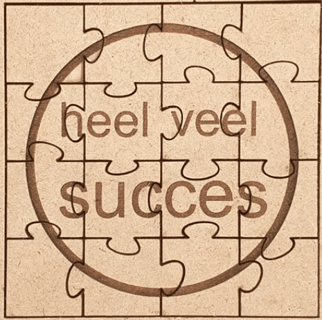 Houten puzzel met de tekst heel veel succes